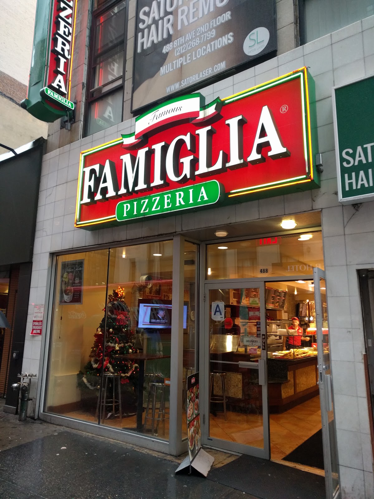 Photo of Famous Famiglia Pizza in New York City, New York, United States - 1 Picture of Restaurant, Food, Point of interest, Establishment, Meal takeaway, Meal delivery
