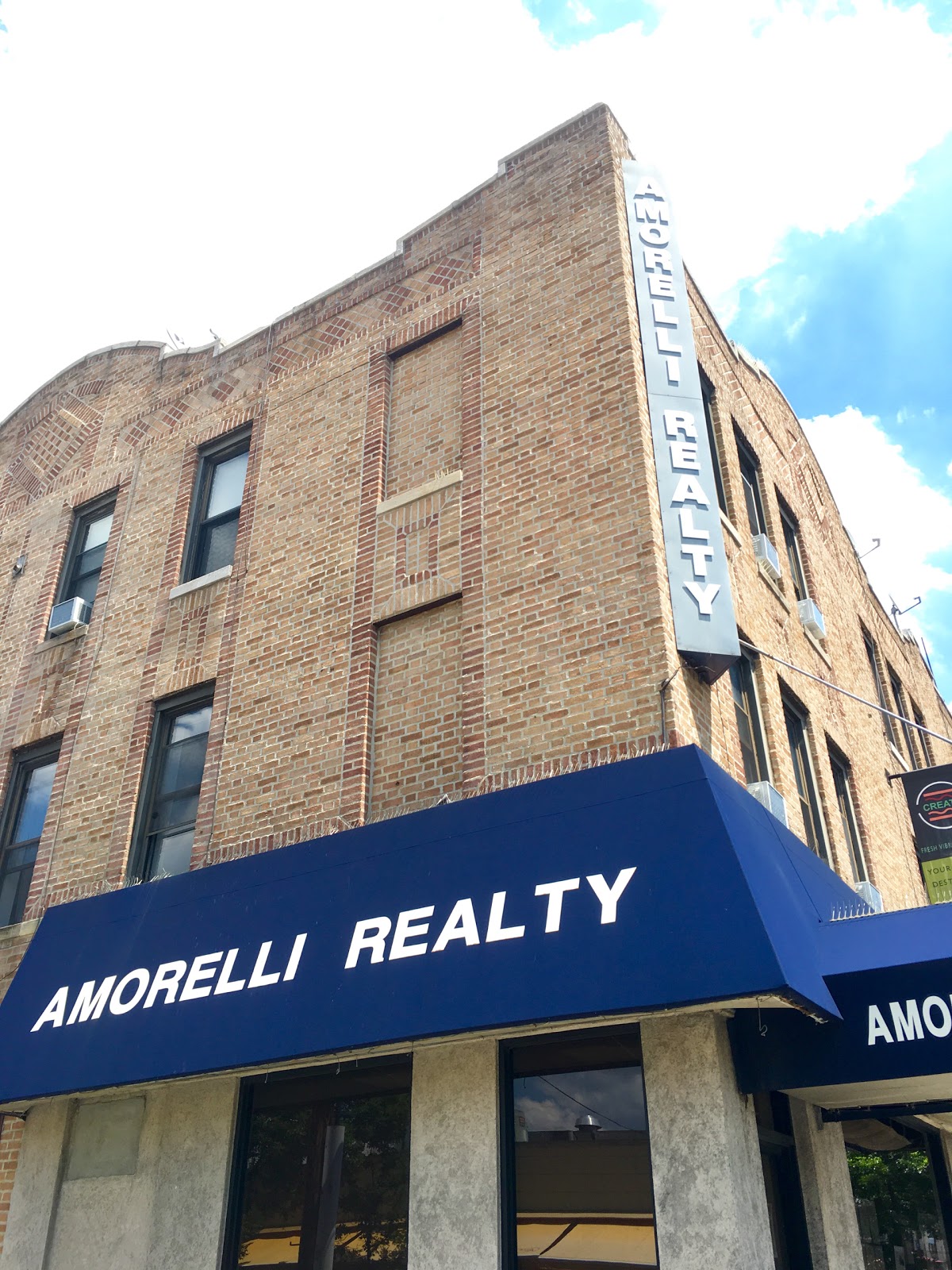 Photo of Amorelli Realty in Queens City, New York, United States - 2 Picture of Point of interest, Establishment, Real estate agency