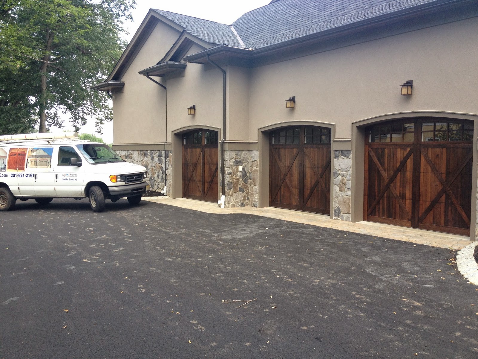 Photo of NJ Garage Door Service in Saddle Brook City, New Jersey, United States - 1 Picture of Point of interest, Establishment, Store, Home goods store, General contractor, Parking