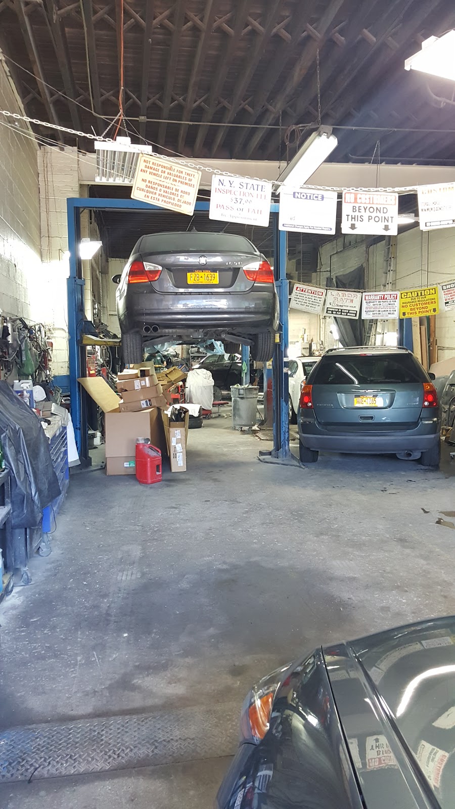 Photo of Genesis Auto Repair & Body Shop in New York City, New York, United States - 2 Picture of Point of interest, Establishment, Car repair