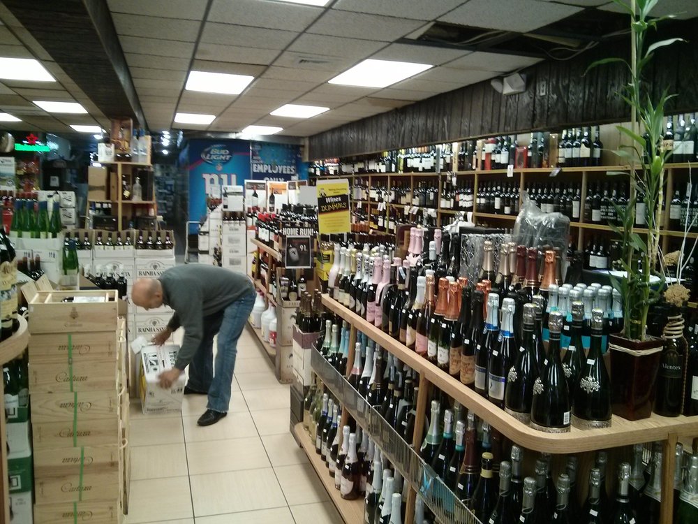 Photo of Oporto Wines & Liquors in Newark City, New Jersey, United States - 1 Picture of Food, Point of interest, Establishment, Store, Grocery or supermarket, Liquor store