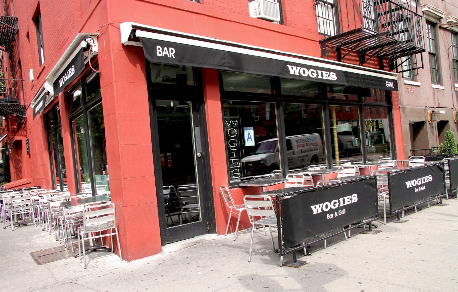 Photo of Wogies Bar & Grill in New York City, New York, United States - 1 Picture of Restaurant, Food, Point of interest, Establishment, Meal takeaway, Bar