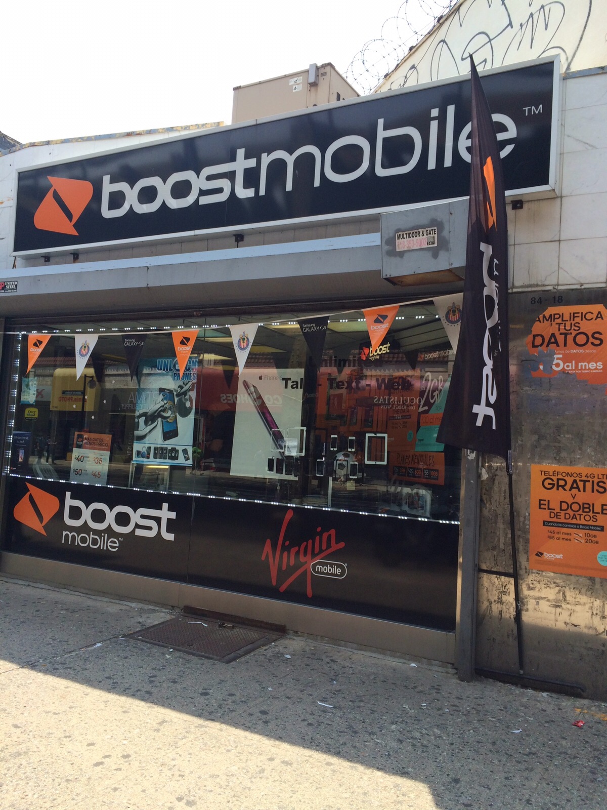 Photo of Boost Mobile Store by Mobile Comm in Queens City, New York, United States - 3 Picture of Point of interest, Establishment