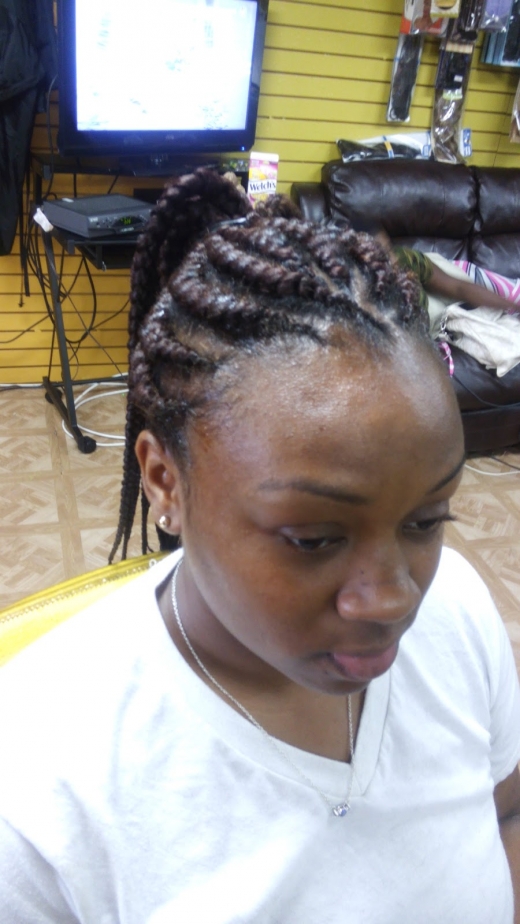 Photo by Stacey Burgess for Uptown Star African Hair Boarding or Juma African hair braiding