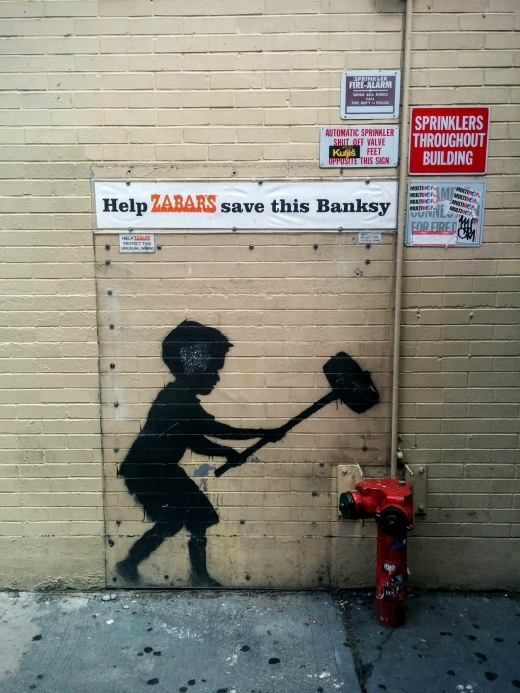Photo by Tassilo Kubitz for Banksy "Hammer Boy" Mural