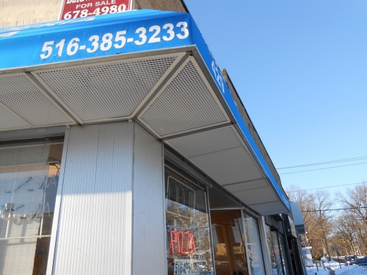 Aric Signs & Awnings in Hempstead City, New York, United States - #1 Photo of Point of interest, Establishment, Store, Clothing store